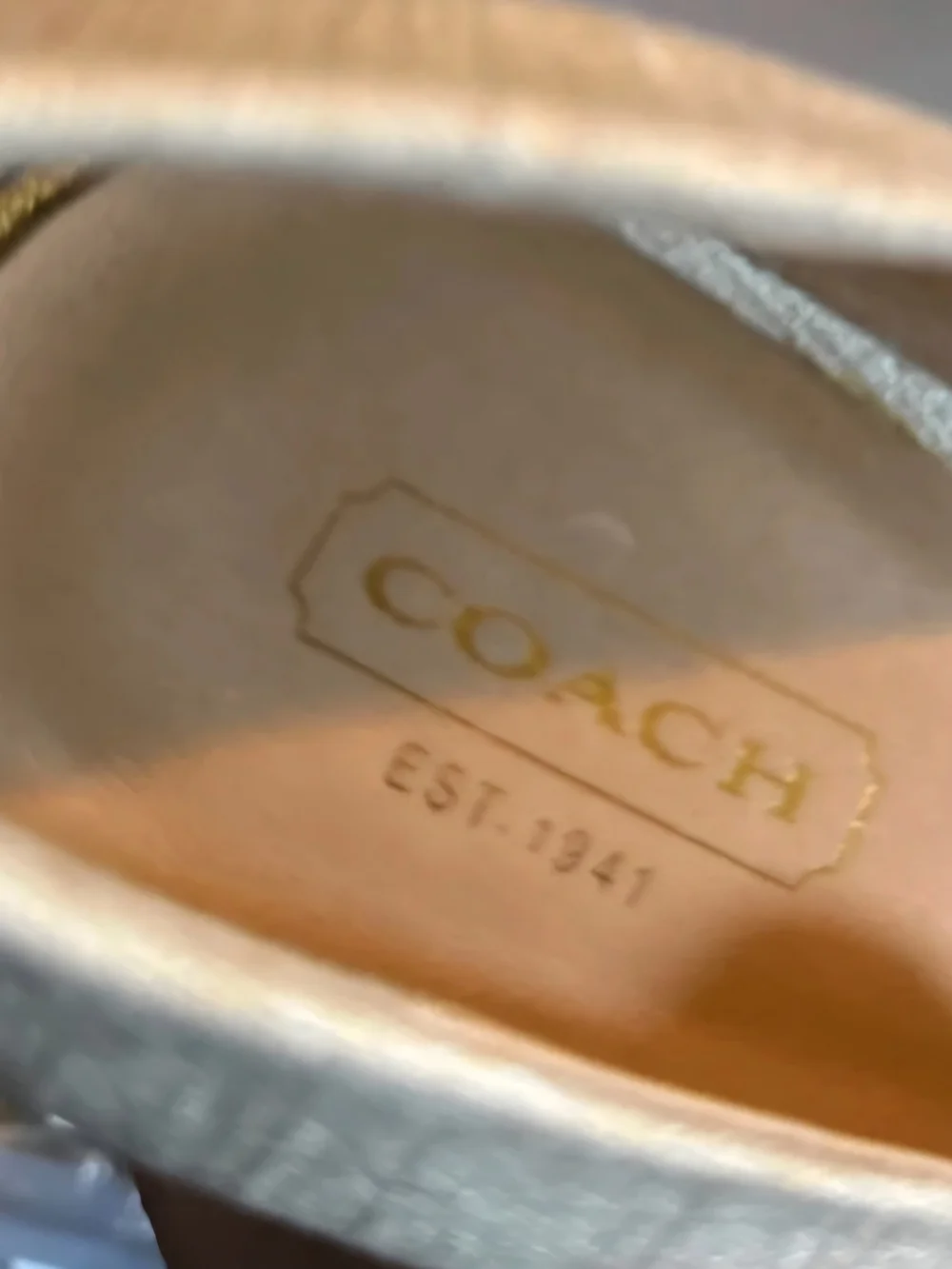 Coach wedge pumps